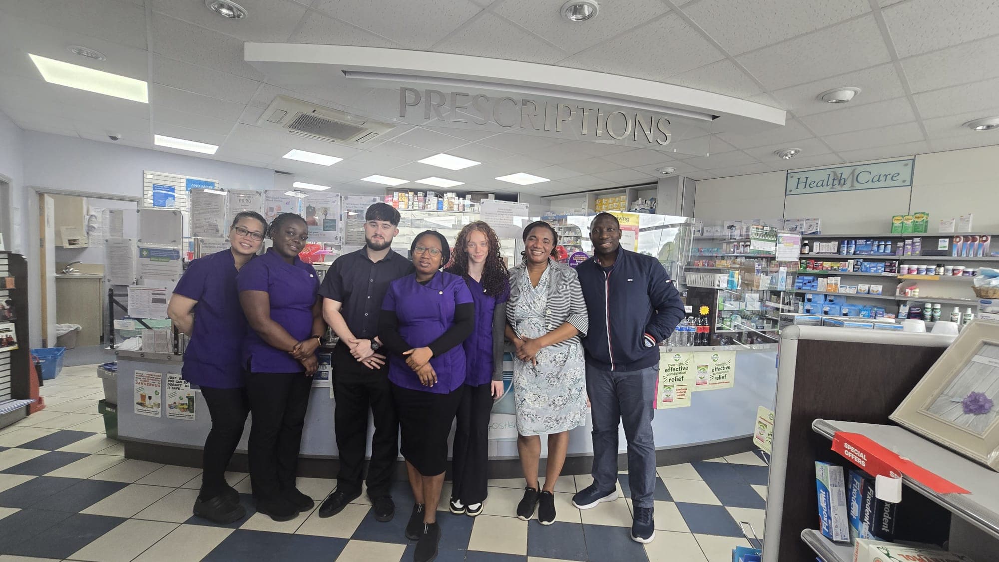 Goshen Pharmacy interior and patient-facing care photograph
